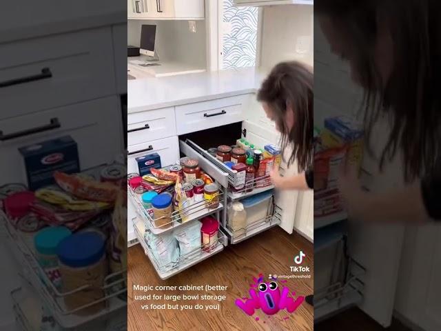 Showing off the Magic corner storage in this kitchen I designed.