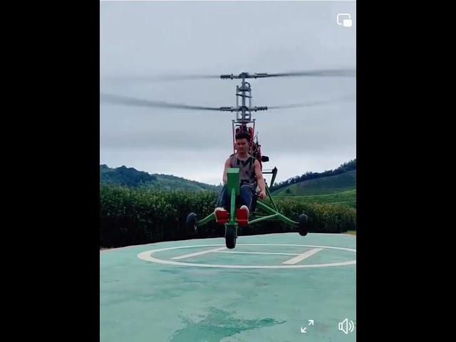 Unbelievable Helicopter Flight: Man Takes to the Air!