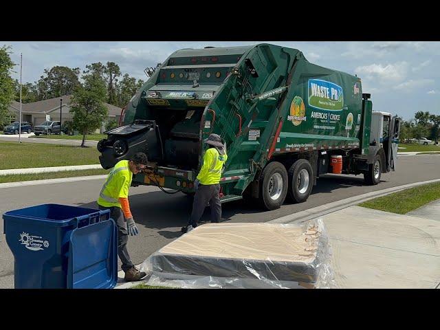 Waste Pro CNG Mack LEU New Way Rear Loader Garbage Truck Packing a Mattress