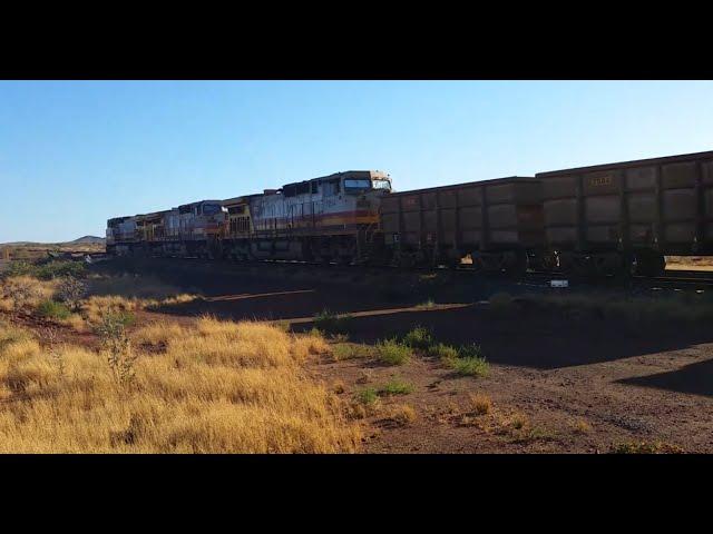 Train of Western Australia...Pilbara Iron Match Up leads 7054 with Empties from Dampier to Tom Price