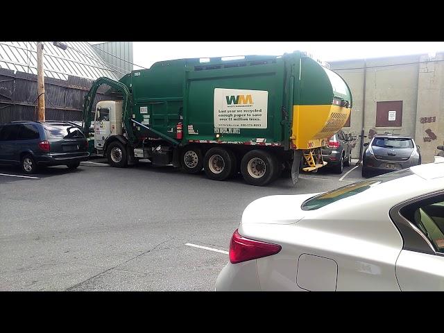 Waste management truck with a new driver