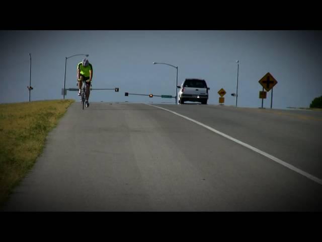 Aaron Linn rides a bicycle across oklahoma