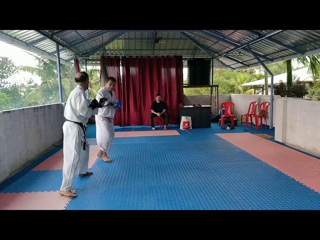 Senior Adults at Rei getting trained for karate fights,