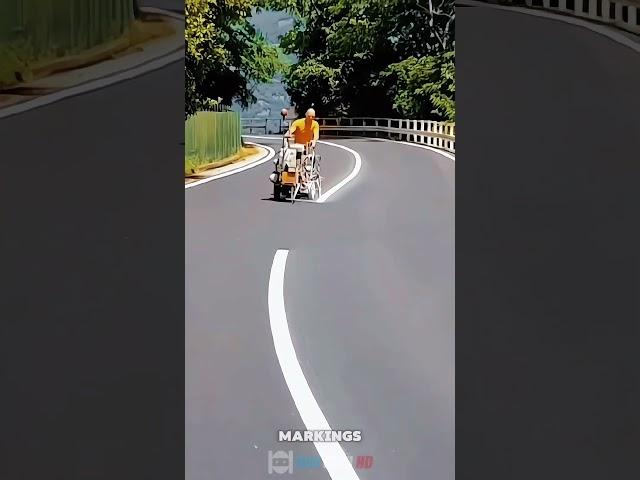 Road construction work making center line road markings