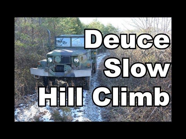 Deuce Idling up a hill with some snow and mud.