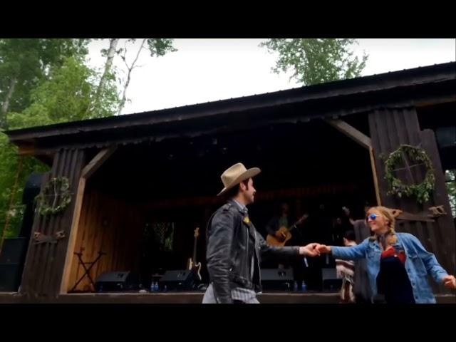 Okie From Muskogee by Merle Haggard.  My brother Kyle took this at the Firefly Stage at NCF 2022.