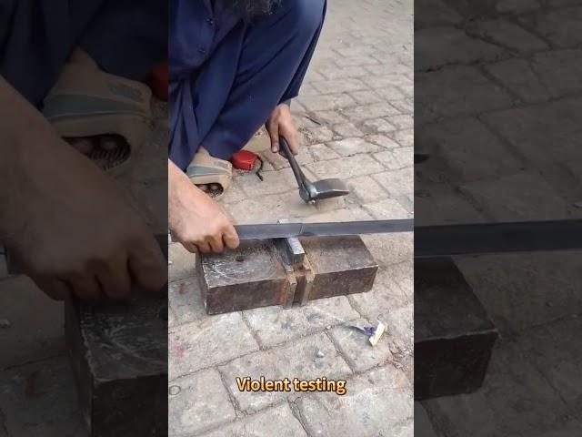 Hammer and axe work together to efficiently split steel bars