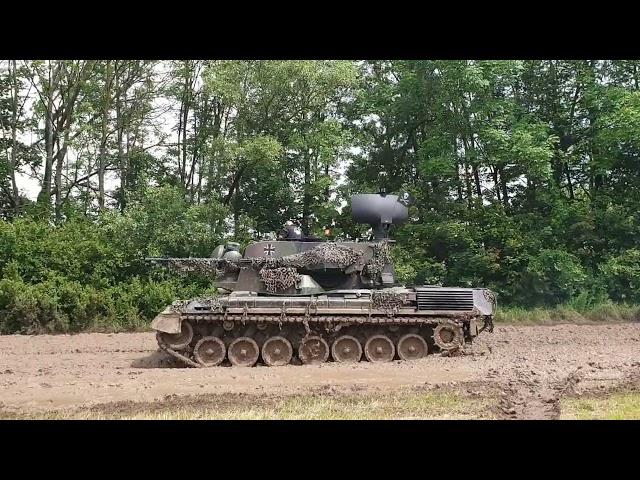 Leopard 1 and 2 tanks, Marder Aifv,  Gepard flakpanzer and bergepanzer through the mud.