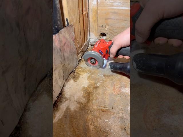 tile guy found a wet piece of rebar with his grinder