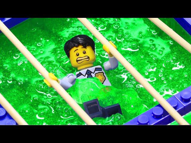 Police Trying to Escape Toxic Slime Tank - Lego Police