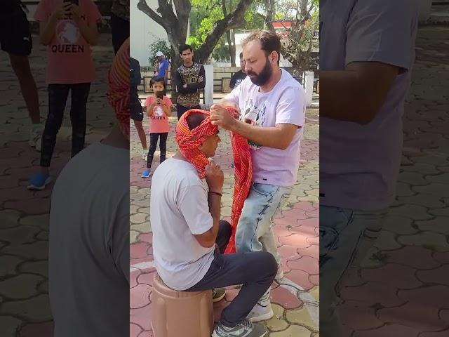 Fastest time to tie a turban - 14.12 seconds by Aditya Pacholy 