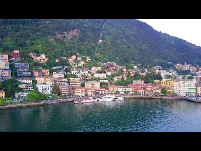 Como city at dusk - Lake Como Italy by drone