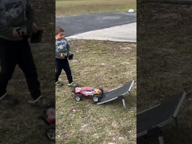 4yr Old Back Flips a Traxxas Rustler off T-Bone Ramp…