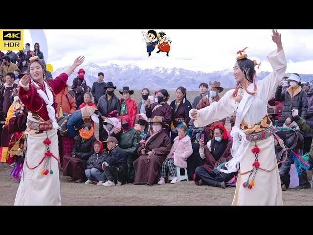 The Tibetan dance under the snow mountain is beautiful and cheerful!