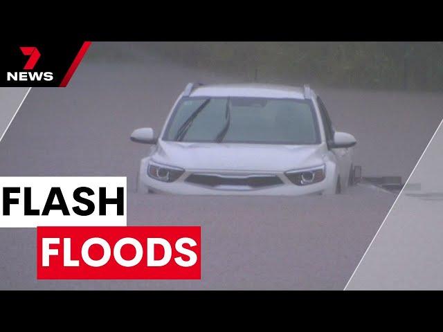 Heavy rain causes flash floods across Brisbane and the Redlands | 7NEWS