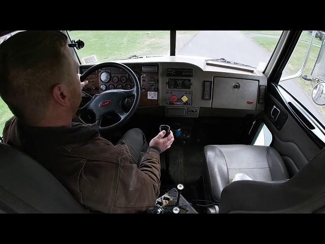 Taking a ride in my Peterbilt  to the dump and delivering dumpster.