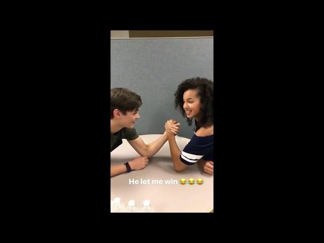 Asher Dov Angel arm wrestling with Sofia Wylie