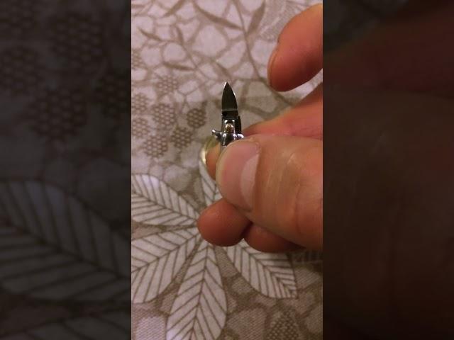 World's smallest automatic stiletto knife.