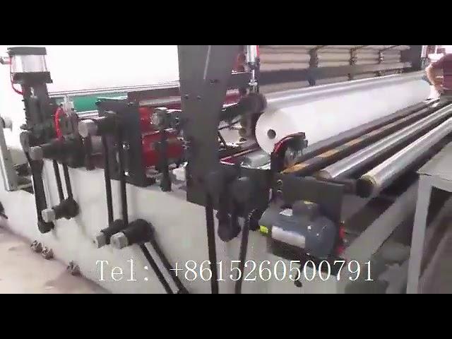 Automatic perforated toilet paper embossing maxi roll rewinding machine