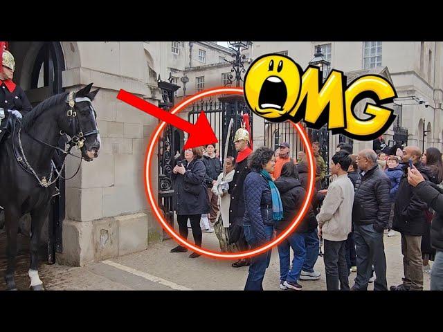 "OMG"! King's Guard bumps tourist out of the way!