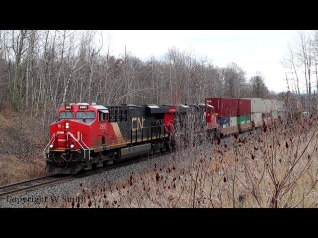 Full throttle uphill drag for a CNR container train. Climbing part of the Niagara Escarpment.