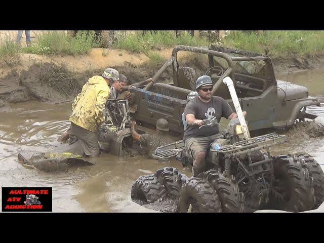 YAMAHA 8 WHEELER AND RENEGADE PUSHING A JEEP?