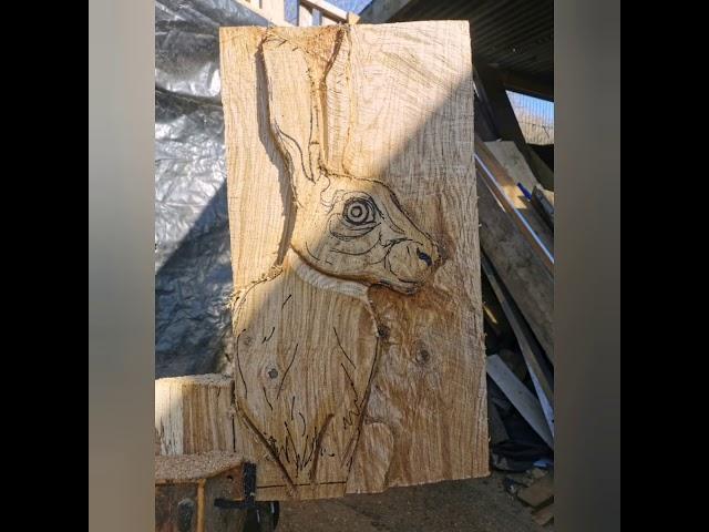 Relief carving a hare wall piece