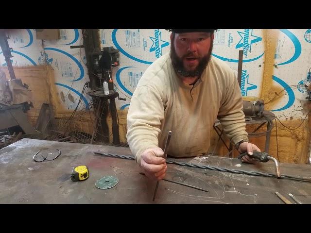 Forging Decorative Barbed Wire for a custom railing.