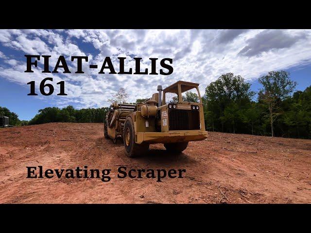 1989 161 Fiat-Allis Scraper (Grading on the 6 acre clearing job)