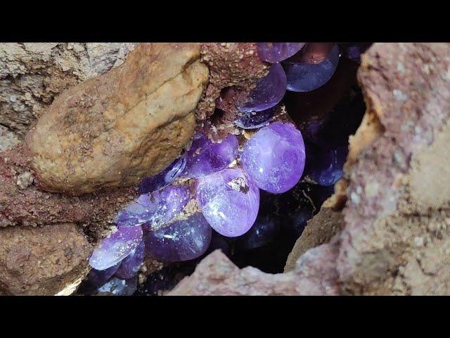 Cracks in the valley after the earthquake. Some purple crystal eggs appear