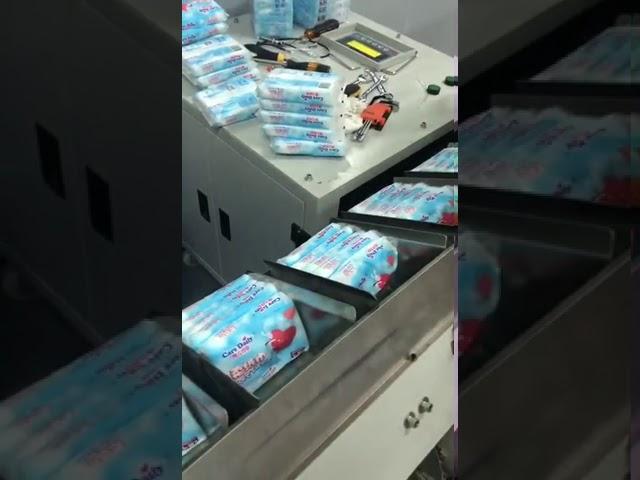 Semi automatic sanitary napkin packing machine