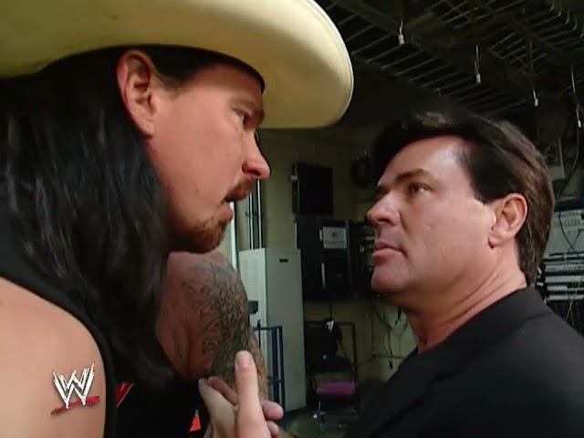 Eric Bischoff meets The Undertaker at backstage during his first night in WWE. JUL. 15, 2002