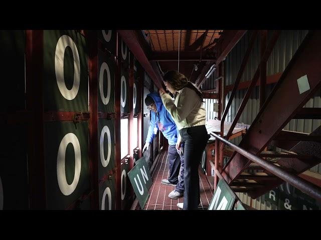 Football - Inside the Cubs Manual Scoreboard at Wrigley Field