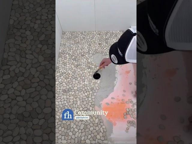 Tiler Adds Pebbles to Shower