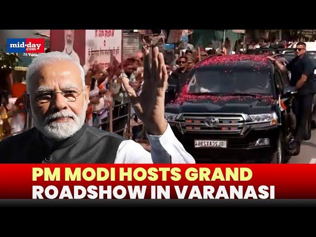 PM Modi holds grand roadshow in Varanasi, thousands on streets to get a glimpse