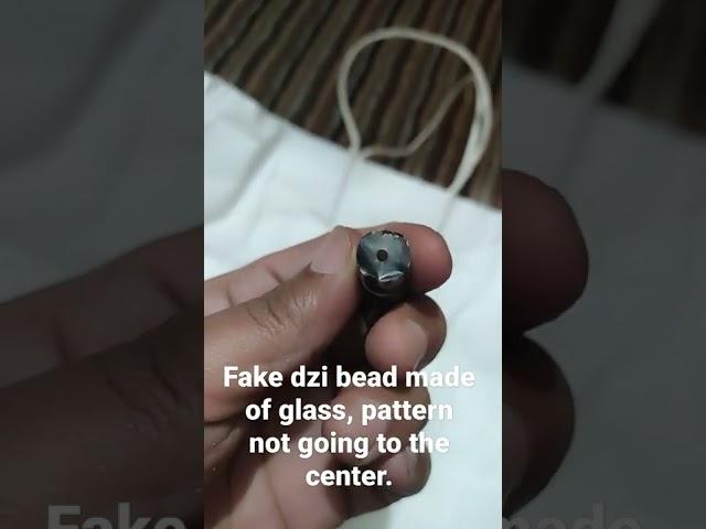 fake dzi bead made of glass. #fake#dzi#beads#ancient#agate#etched#tibetan#