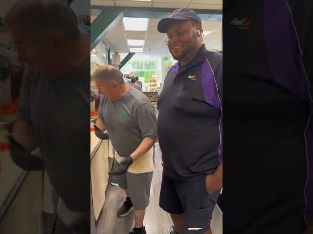 Fedex and The Deli Guy make a sandwich