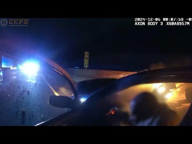 Video shows Cobb police officer rescue injured driver from burning car on I-285