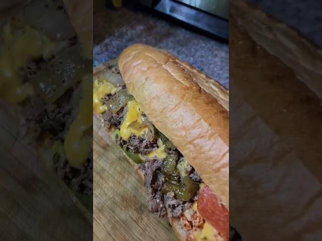 The Ultimate Cheesesteak doesn't exi....SIKE!!! 1/2 shaved ribeye and 1/2 Chicken Pepperoni Pizza!!