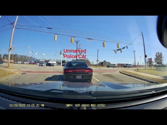 Driver pulled out in front of unmarked police car