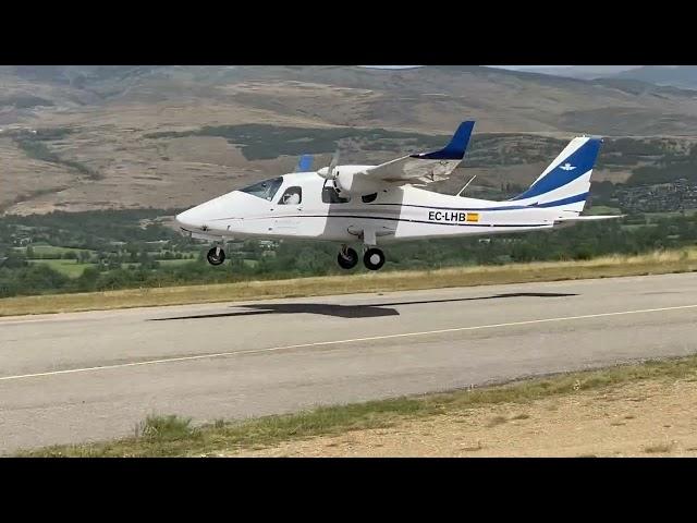 Tecnam Twin engine is making touch and goes at Cerdanya Aerodrome.