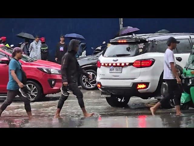 Heavy rain triggers floods in Manila along Taft Avenue