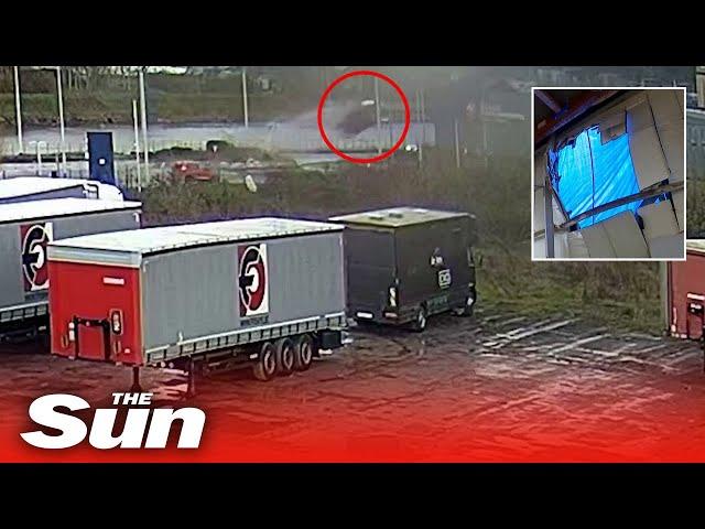 Moment car sent flying crashes into sports centre wall in Belgium