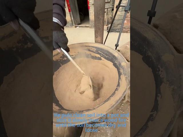 Farmer Hand Stirring Soil to Make Traditional Clay