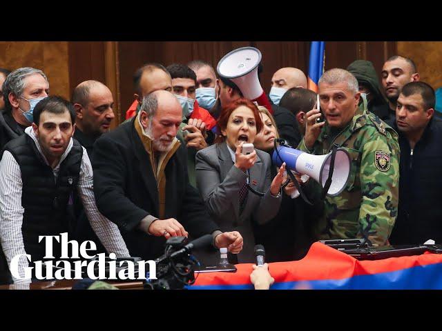 Armenian protesters storm government building after peace deal announced