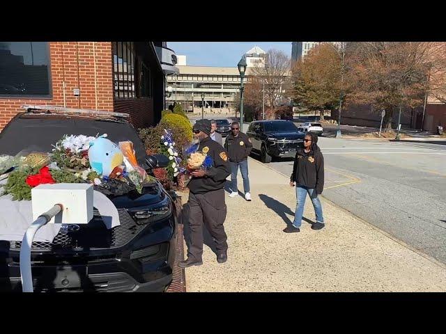 Guilford Co. Sheriff Danny Rogers visits Officer Horan's memorial