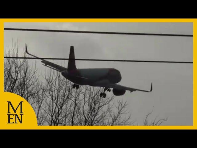 Pilots battle strong winds as they land at Manchester Airport