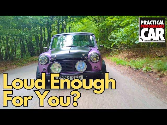 Twin carb fed Mini tears up the countryside. Loud, lairy - and very very purple? Most definitely.