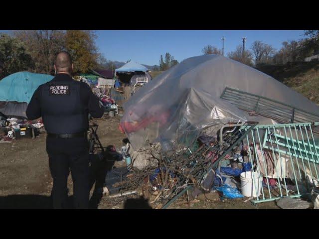 Police work to clear out and clean up homeless encampment north of Redding