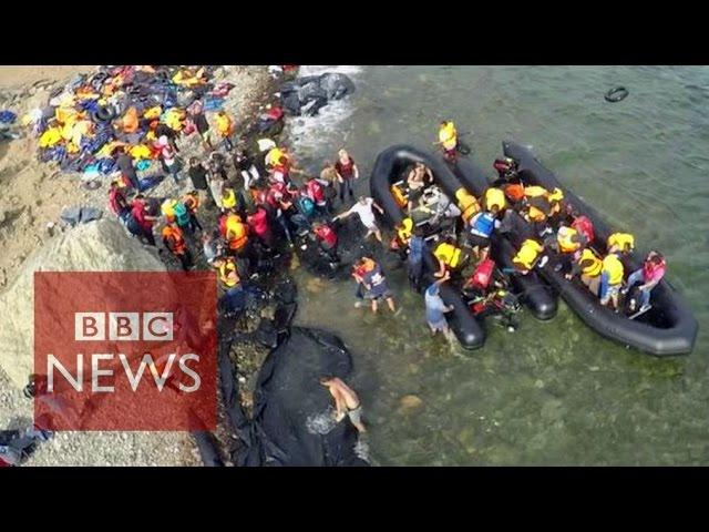 Drone video shows migrants' arrival - BBC News